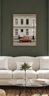 Charming Urban Scene with Orange Car Poster - Posterbox.dk