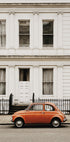 Charming Urban Scene with Orange Car Poster - Posterbox.dk