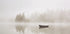 Solitary Boat on a Foggy Lake Poster - Posterbox.dk