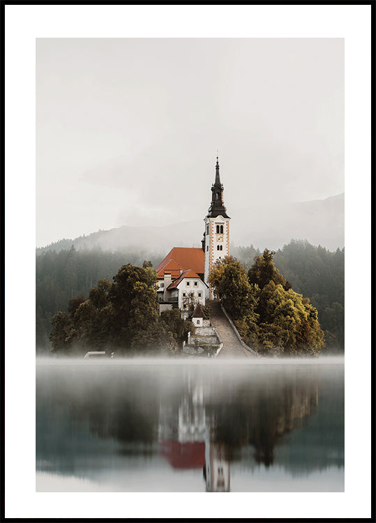 A Church On An Island In The Middle Of Lake Bled Poster - Posterbox.dk
