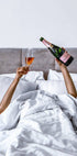 Woman Champagne in Bed Poster - Posterbox.dk