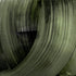The image is a close-up of a textured, green-coloured surface with a repeating pattern of vertical lines and curves.