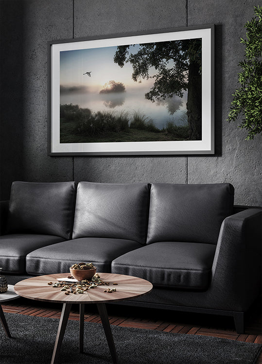 Heron Flying Over a Foggy Lake Poster - Posterbox.dk