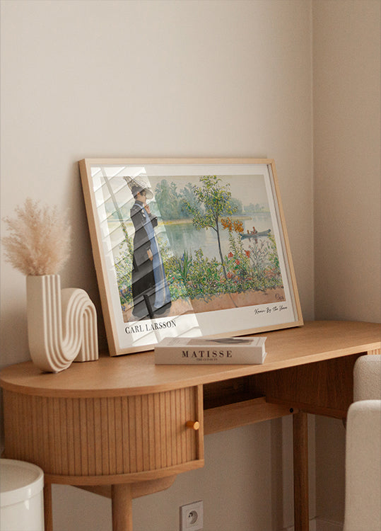 Karin by the Shore, riverside floral garden scene Poster - Posterbox.dk