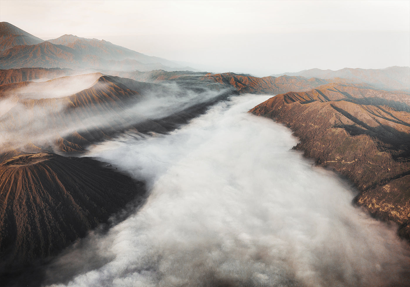 Mystical Gunung Bromo: A Serene Volcano in the Mist Poster - Posterbox.dk