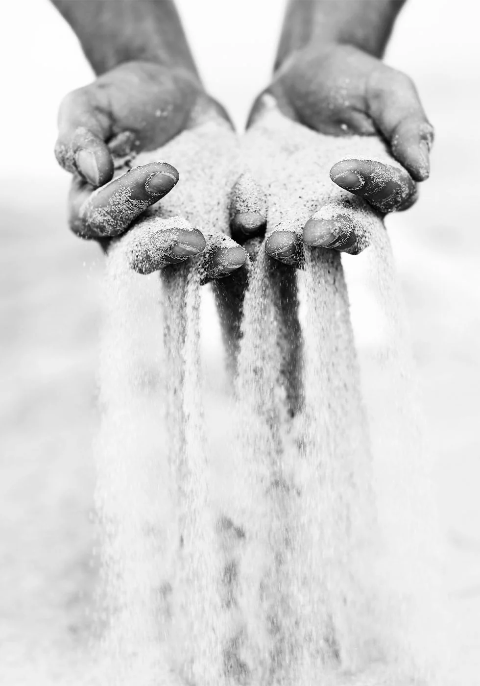 Sand Falling From Hands (B&W) Poster - Posterbox.dk