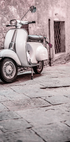 Vintage Scooter in Cobblestone Alley Poster - Posterbox.dk