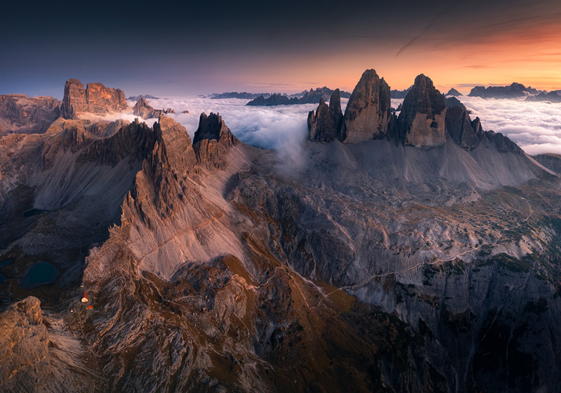 Majestic Peaks Above Clouds